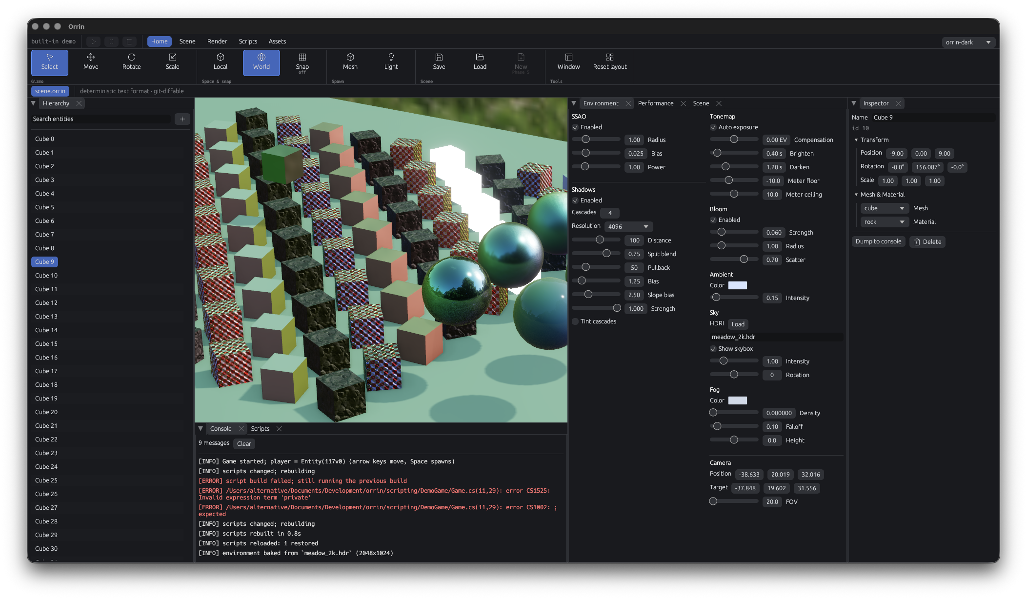 The Orrin editor: an entity hierarchy on the left, a viewport rendering a grid of textured cubes and reflective spheres under an HDRI sky, environment and shadow controls on the right, an inspector for the selected cube, and a console logging scripts rebuilding and reloading.